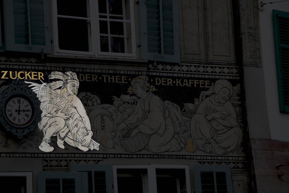 A picture containing text, building

Description automatically generated