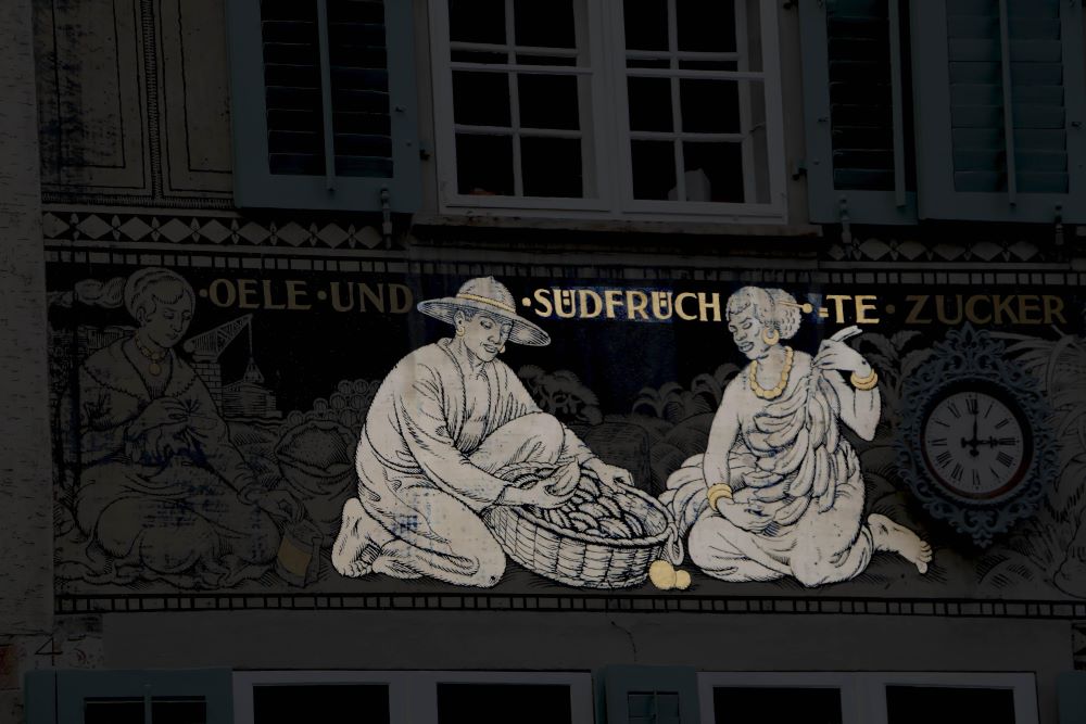 A picture containing text, building, window

Description automatically generated
